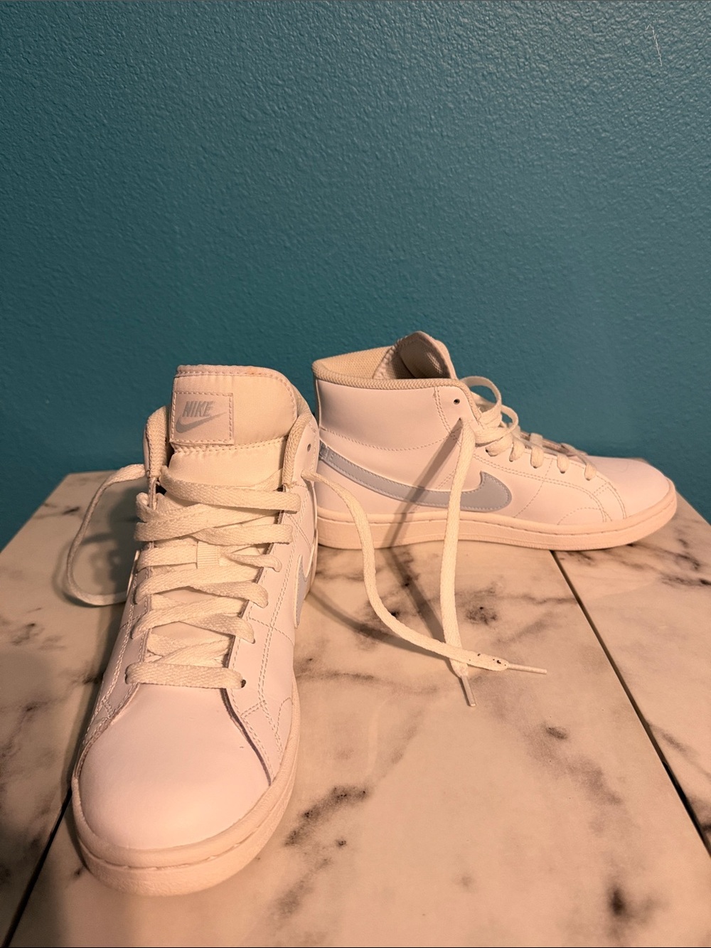 Nike Court Royale 2 Women’s Mid-Top Sneakers in white with Light blue Swoosh